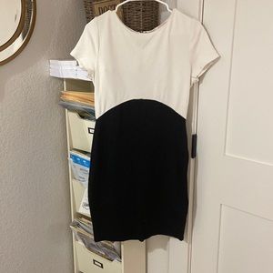 Boss lady dress size large, super comfortable and stretchy. Also thick.